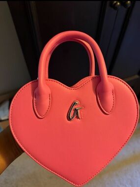 Pink Heart-Shaped Top-Handle Bag with Silver Accent